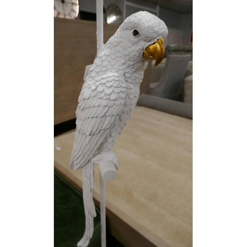 1429 - A white floor standing parrot lamp