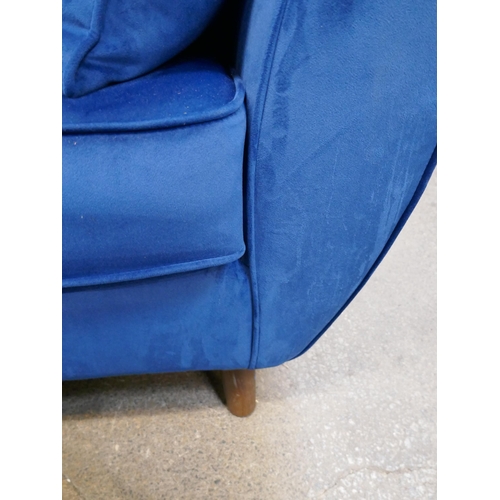 1454 - A Hoxton blue velvet three seater sofa and storage footstools £1237