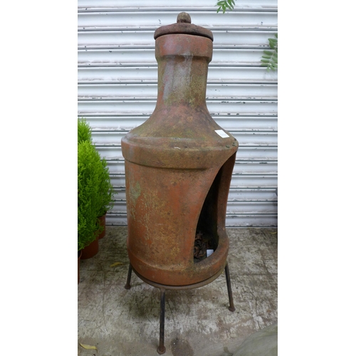 2214 - A Chiminea clay burner on stand (32