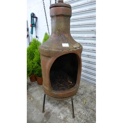 2214 - A Chiminea clay burner on stand (32