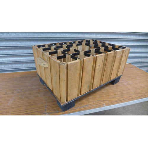 2235 - A wooden and metal wine crate planter