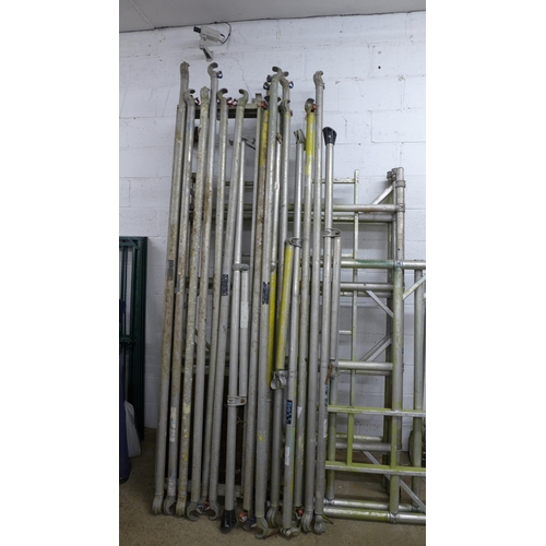 2277 - A Youngman Boss aluminium sectional scaffolding tower- with six side sections, two work platforms, a... 