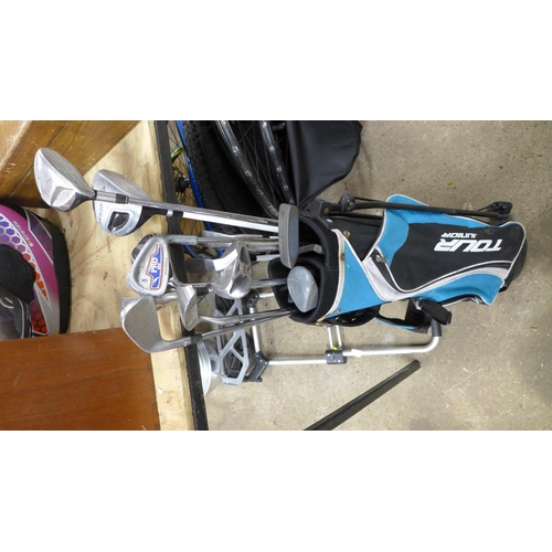 2282 - Five golf bags containing a large quantity of assorted golf clubs including Donnay, MCX, MacGregor, ... 