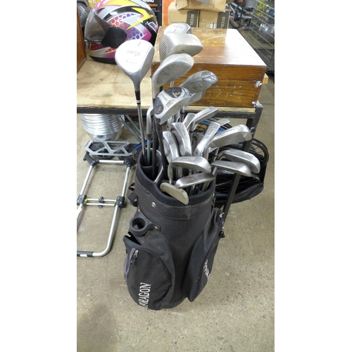 2282 - Five golf bags containing a large quantity of assorted golf clubs including Donnay, MCX, MacGregor, ... 