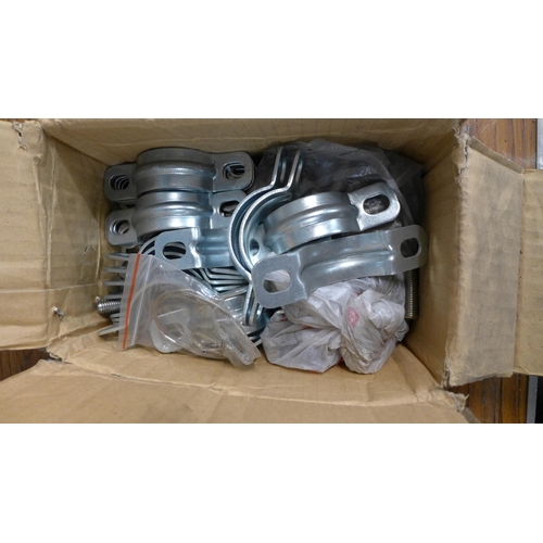 2297 - A large quantity of galvanized fittings including racking pins and wall brackets