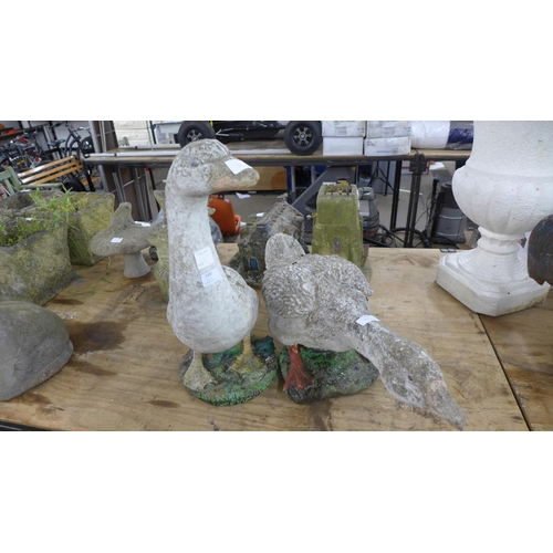 2300 - A pair of concrete geese garden ornaments