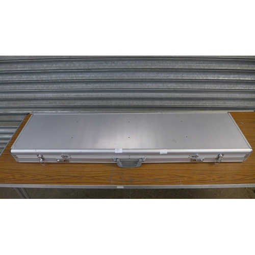 2332 - A 5ft aluminium gun case, unused with keys