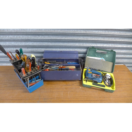 2336 - An Enox metal tool box with a quantity of tools and Bosch PST.50E jigsaw