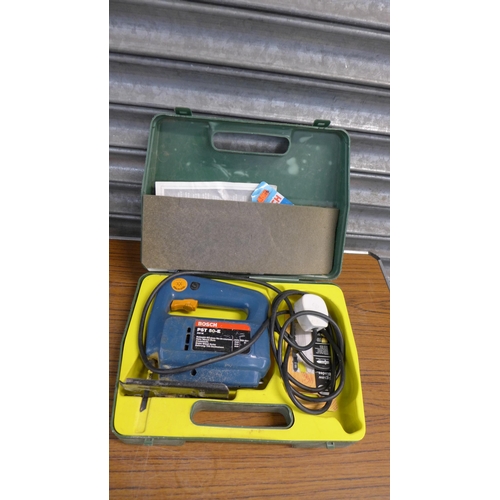 2336 - An Enox metal tool box with a quantity of tools and Bosch PST.50E jigsaw