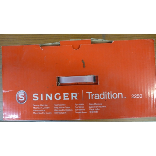 2337 - A boxed Singer Tradition 2250 sewing machine