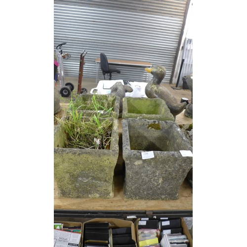 2340 - A set of four stone effect concrete square planters