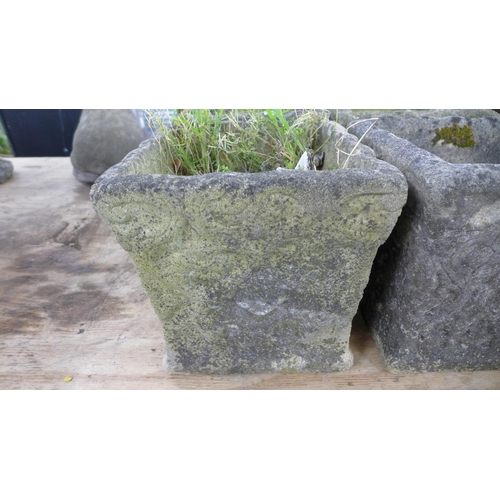 2340 - A set of four stone effect concrete square planters