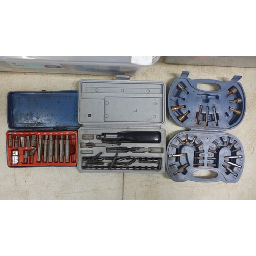 2015 - Two boxes of assorted tools including socket sets, tap and die set, brake pads and bearings, machine... 