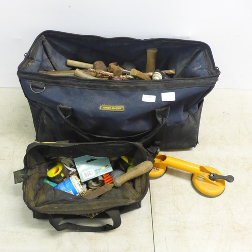 2044 - A Powermaster tool bag of tools including 2 spirit levels, hammers, drill bits, G-clamps, a Dewalt t... 