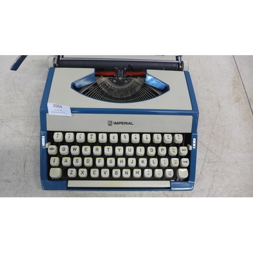 2064 - An Imperial Tab-O-Matic typewriter and a Brother Super 7300T electric typewriter