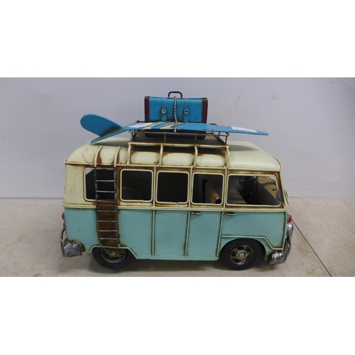 2099 - A tin plate model of a vintage VW camper van