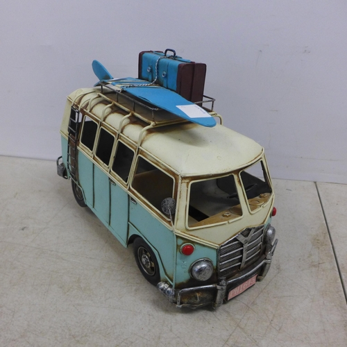 2099 - A tin plate model of a vintage VW camper van