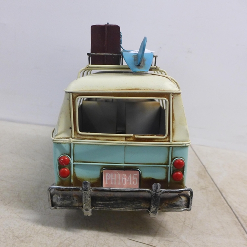 2099 - A tin plate model of a vintage VW camper van