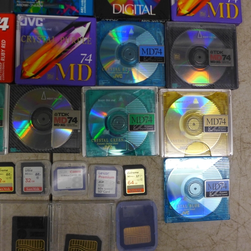 2101 - A quantity of approximately 35 blank recordable mini discs including Sony, TDK, JVC, etc and a selec... 