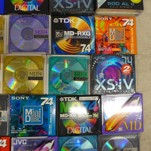 2101 - A quantity of approximately 35 blank recordable mini discs including Sony, TDK, JVC, etc and a selec... 