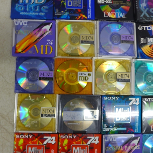 2101 - A quantity of approximately 35 blank recordable mini discs including Sony, TDK, JVC, etc and a selec... 