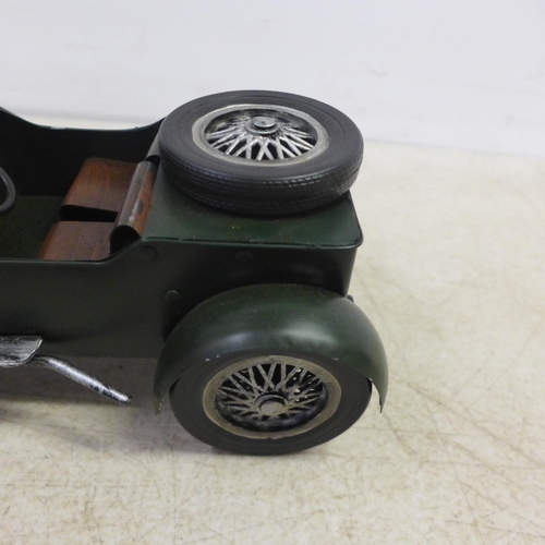 2104 - A tin plate model of a vintage car