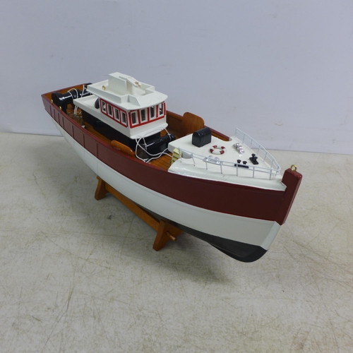 2106 - A wooden model of a fishing boat