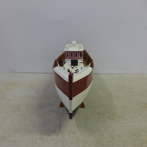 2106 - A wooden model of a fishing boat