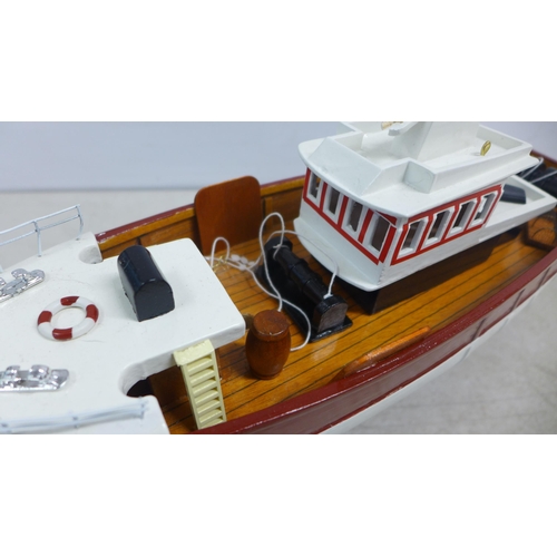 2106 - A wooden model of a fishing boat