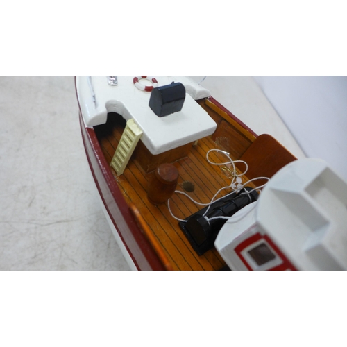 2106 - A wooden model of a fishing boat