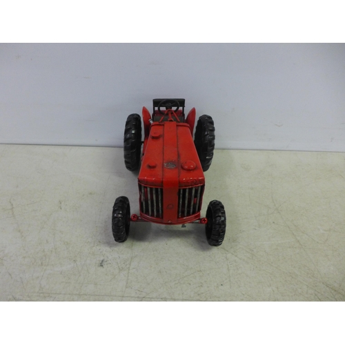 2108 - A tin plate model of a tractor