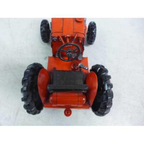 2108 - A tin plate model of a tractor