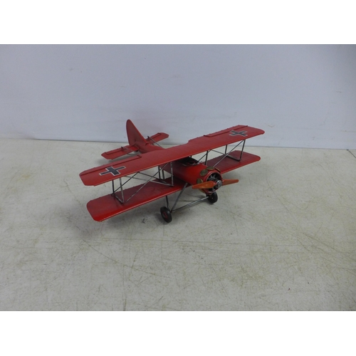 2109 - A tin plate model of a bi-plane