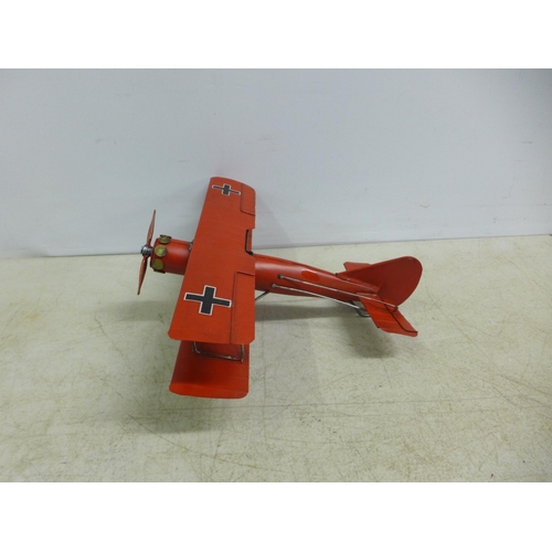 2109 - A tin plate model of a bi-plane