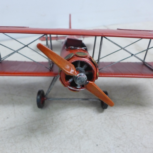 2109 - A tin plate model of a bi-plane