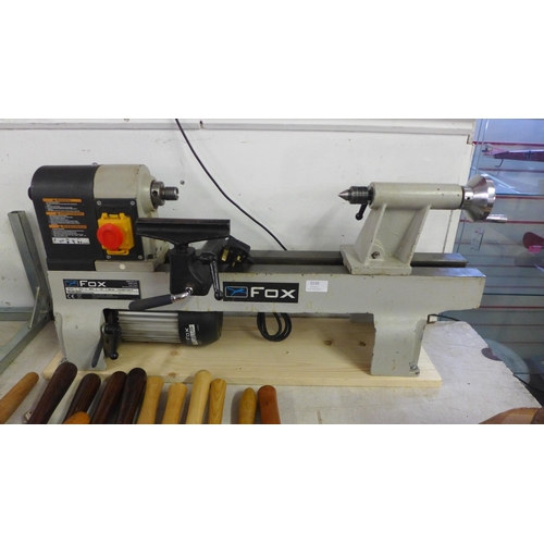 2110 - A Fox F46-251 bench lathe with a quantity of assorted wood including Purple Heart and Kambala etc. a... 