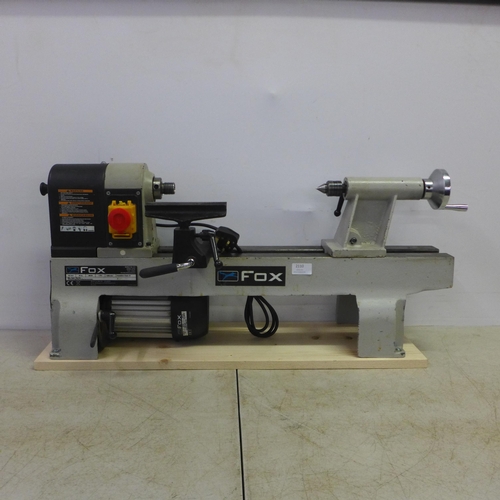 2110 - A Fox F46-251 bench lathe with a quantity of assorted wood including Purple Heart and Kambala etc. a... 