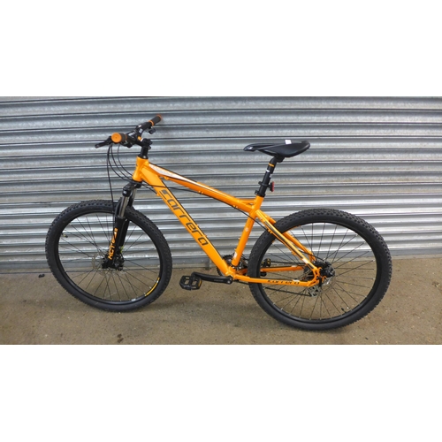 A Carrera Vengeance orange and black gents twin disk hard tail mountain bike