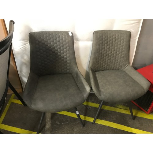 1471 - A pair of grey leather effect side chairs *This lot is subject to VAT