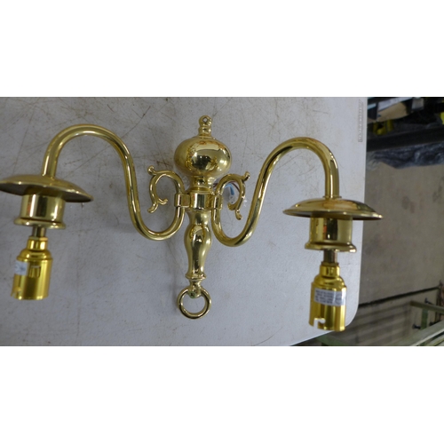 2389 - A box of brass chandelier fittings