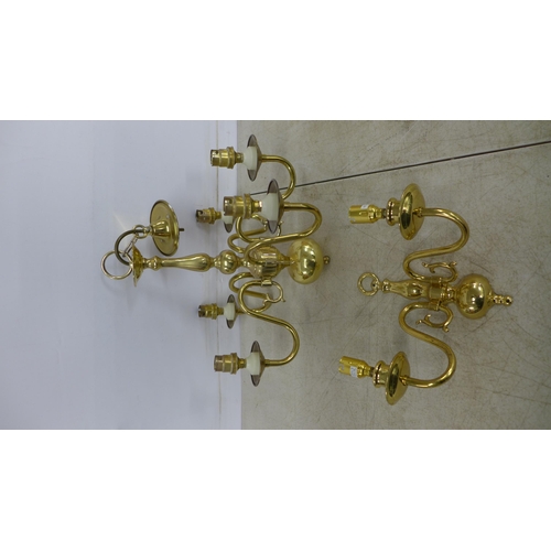 2389 - A box of brass chandelier fittings