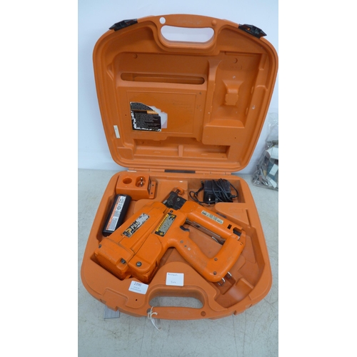 2390 - A Paslode Impulse (IM250-2) cordless 16 gauge straight finish nailer- in case with charger and nails