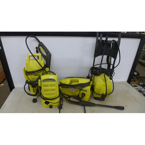 2395 - Four assorted Karcher pressure washers including K2.36, 411A, K2 etc.