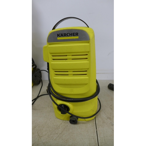 2395 - Four assorted Karcher pressure washers including K2.36, 411A, K2 etc.