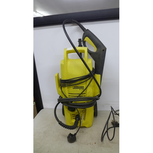 2395 - Four assorted Karcher pressure washers including K2.36, 411A, K2 etc.