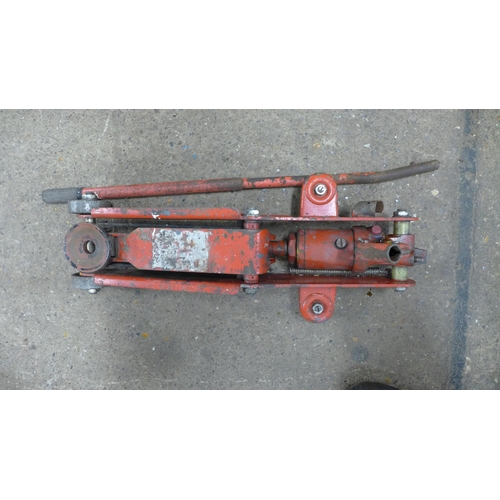 2397 - Two steel van ramps and a hydraulic trolley jack