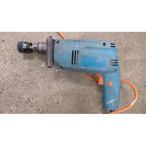 2403 - A Black and Decker drill 240V H552 3100/M, a Pro User 135w palm sander, a Titan Magnesium angle grin... 