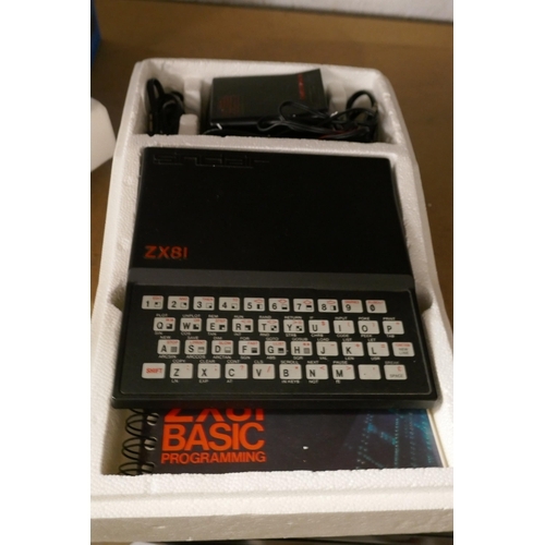 2139 - A Sinclair ZX81 Personal computer with basic programming book and pocket book, a ZX81 printer with i... 