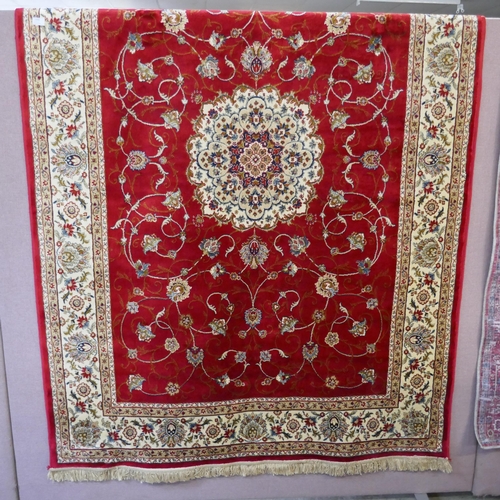 1498 - A Red ground full pile cashmere floral design rug (230x160cm)