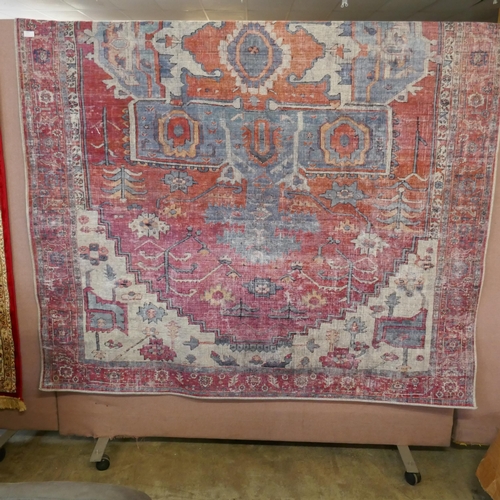 1499 - A Multi-coloured ground vintage look carpet with medallion design (200x300cm)